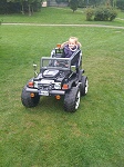 Daisy in her electric 4x4 car